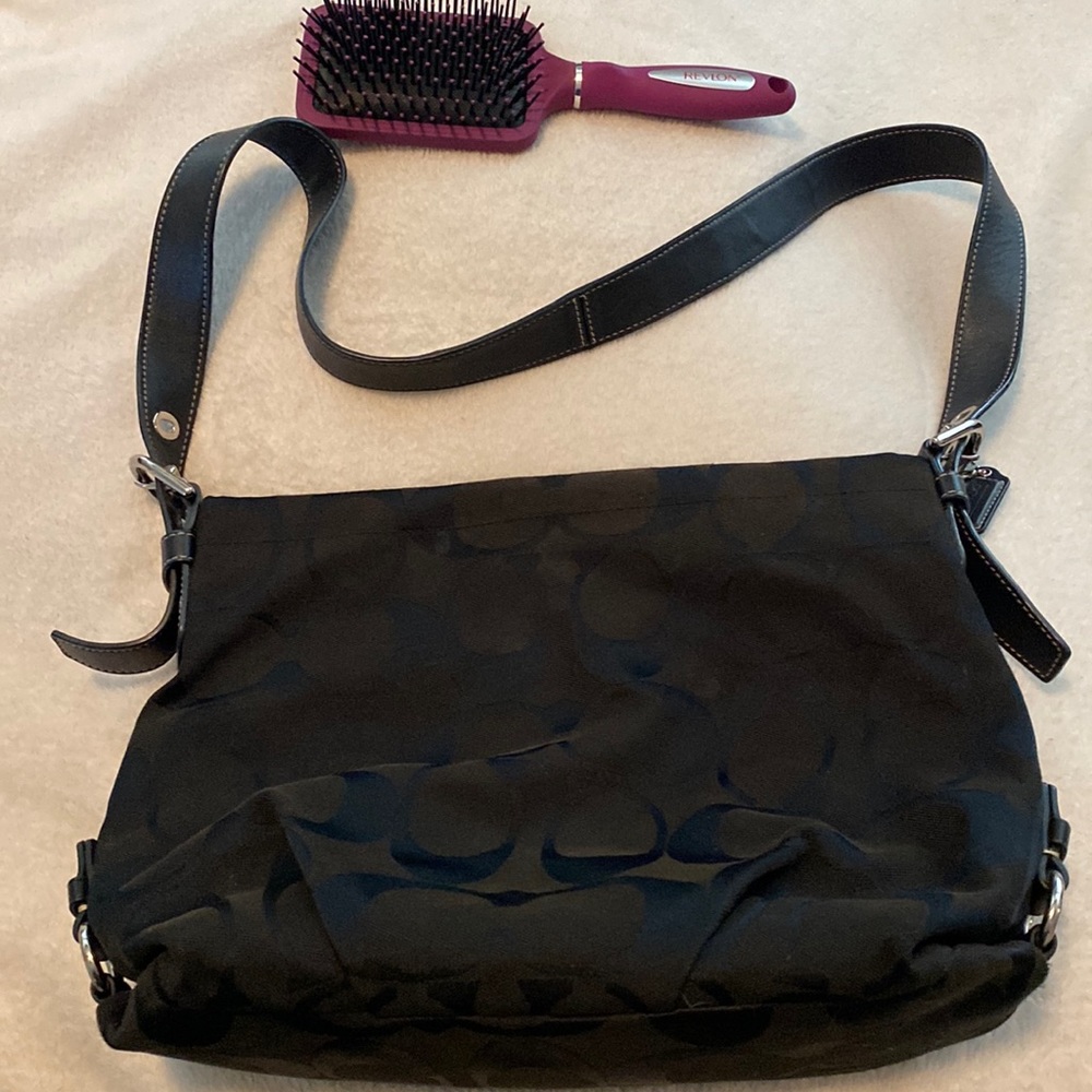 Coach purse barely used could use a wipe down